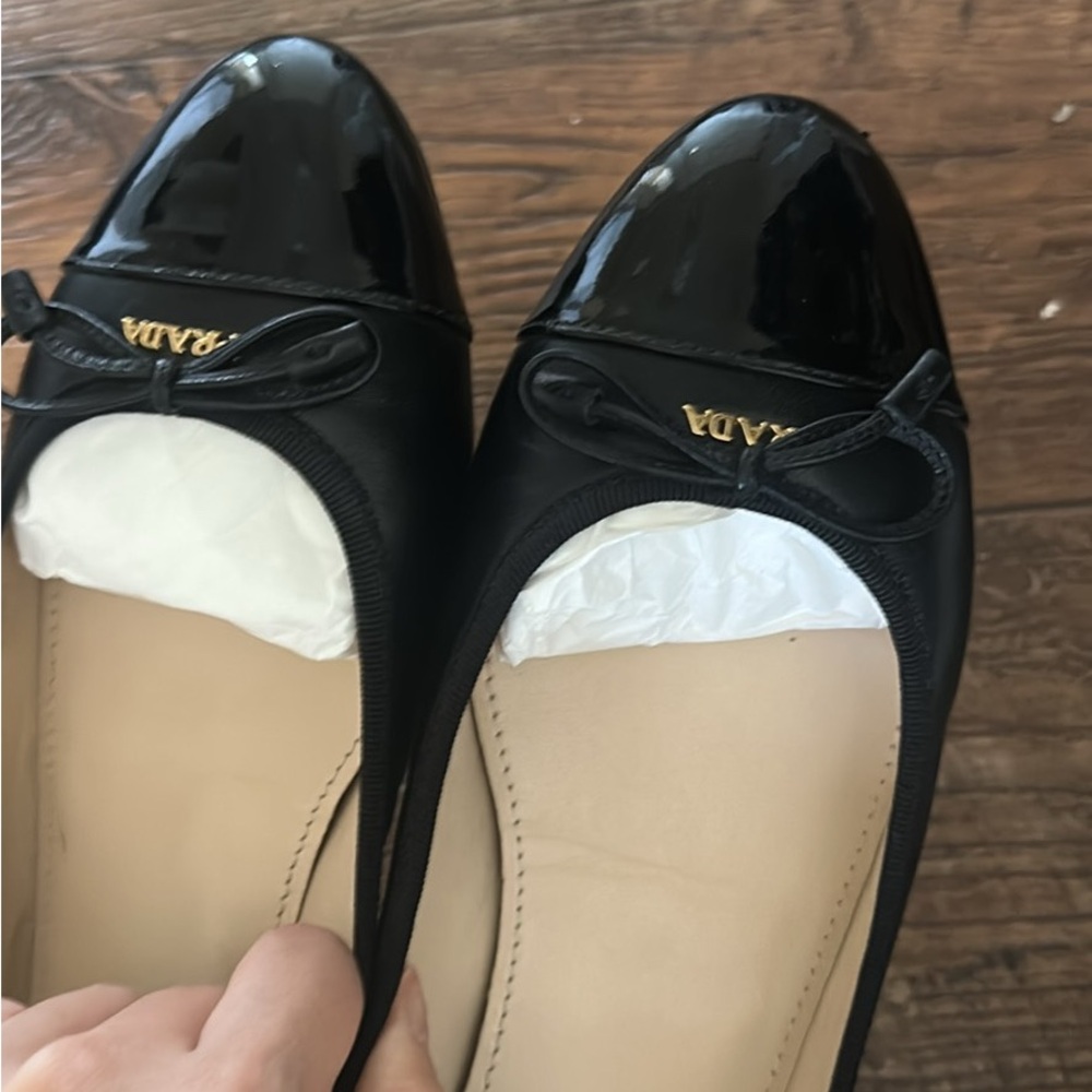 Prada Black Patent Cap-Toe Ballet Flats with Gold Logo
